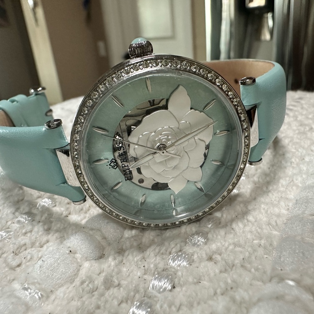 Turquoise and Silver Watch with Textured Bezel and Unique Dial